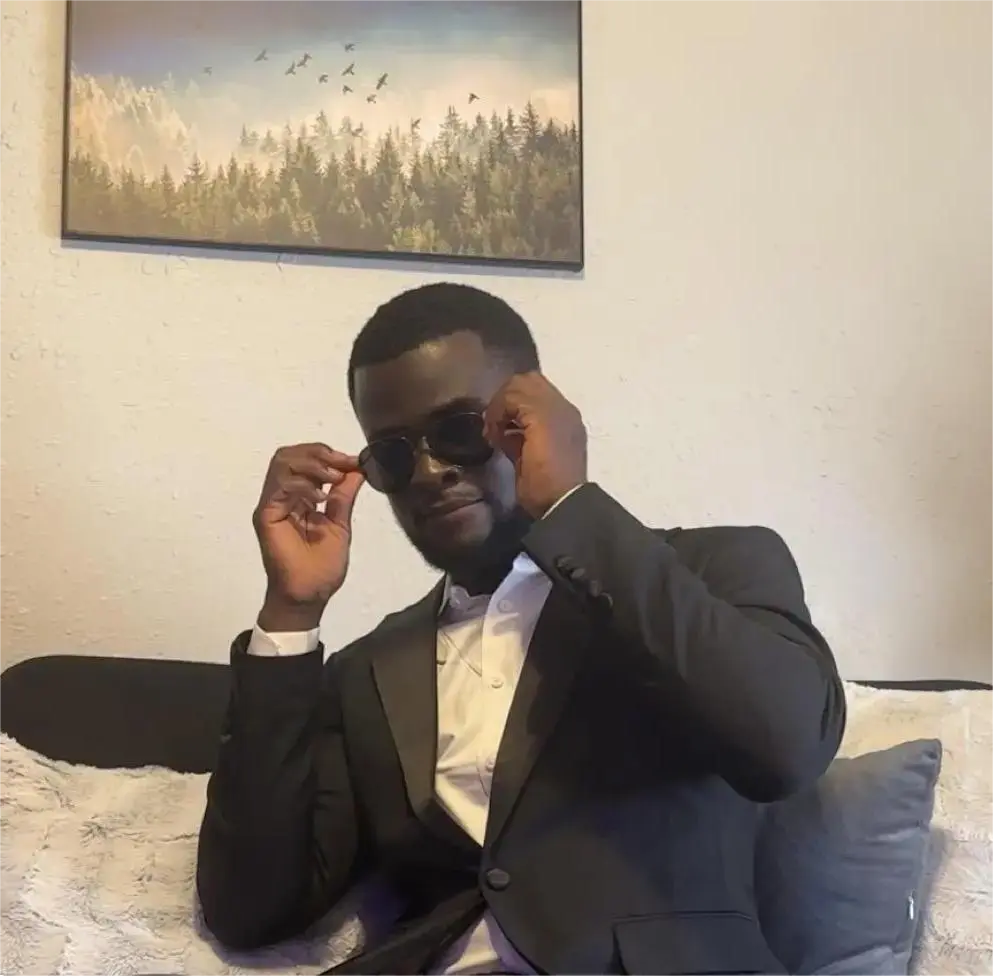 Portrait of Enoch Twumasi - Founder of First and Last Custom Web